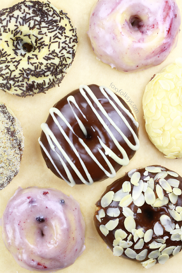 This soft and chewy baked doughnuts use yeast to rise and are baked without using doughnut pan. A healthier version than the deep fried doughnuts that you will surely love. | www.foxyfolksy.com