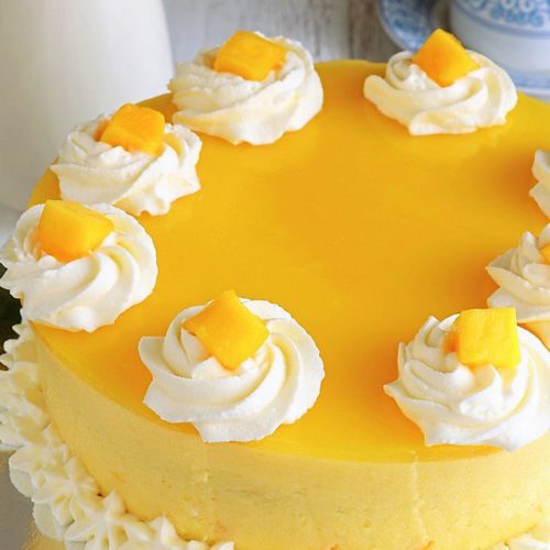 Try this Mango Cake recipe for a cool, not-too-sweet and with a touch of tanginess treat. A perfect balance of flavors that you will surely love. | www.foxyfolksy.com