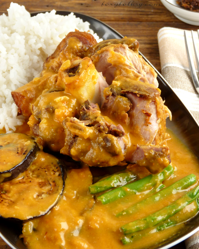 Kare-kare is a popular Filipino dish served at special occasions. Try this crispy Kare-kare recipe that uses pork shank or 'pata' instead of the traditional oxtail and tripe. | www.foxyfolksy.com