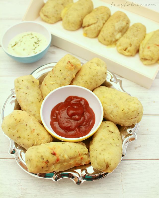 Get addicted to these homemade breadsticks stuffed with jalapeno and your favorite cheese. They are so soft and taste wonderful from different herbs and olive oil. | www.foxyfolksy.com