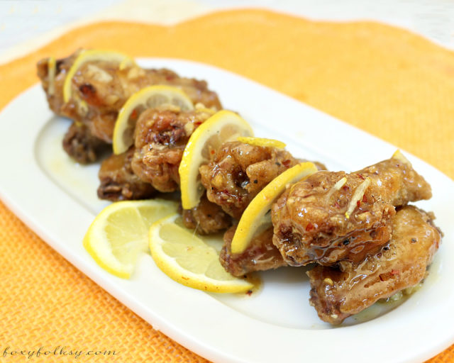 Try this quick and easy Honey Lemon Chicken recipe for a crispy chicken and refreshing sauce made sweet and sour by the combination of honey and lemon. | www.foxyfolksy.com