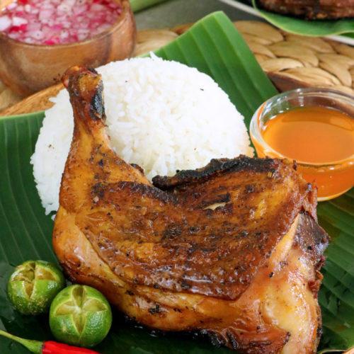 Chicken Inasal freshly grilled with rice and chicken annatto oil sauce