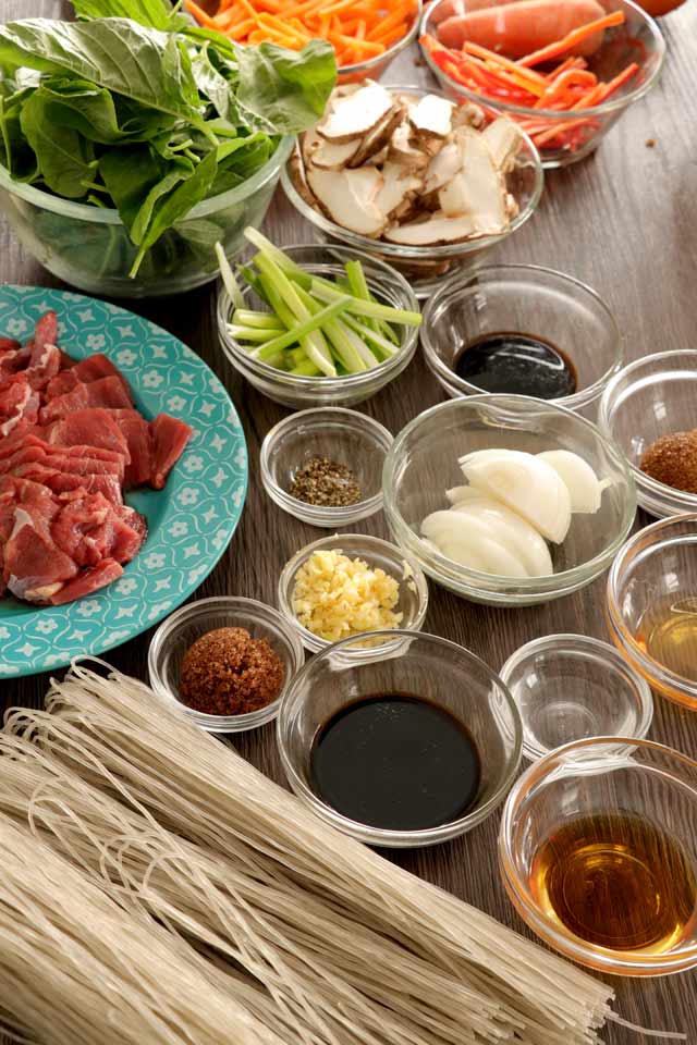 Ingredients for Japchae each placed in a bowl