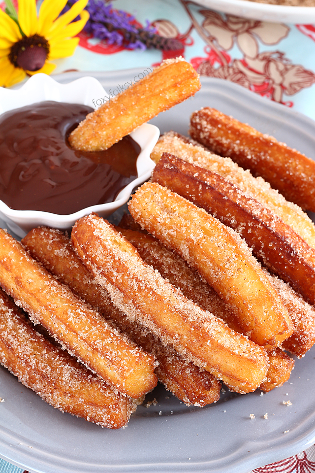 Try this churros recipe for yummy, crunchy dough-fried treat with chocolate dip sauce. So good and filling and so easy to make. | www.foxyfolksy.com