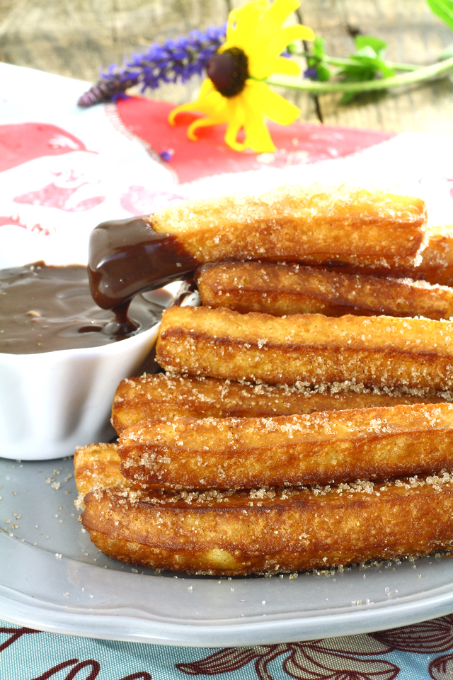 Try this churros recipe for yummy, crunchy dough-fried treat with chocolate dip sauce. So good and filling and so easy to make. | www.foxyfolksy.com