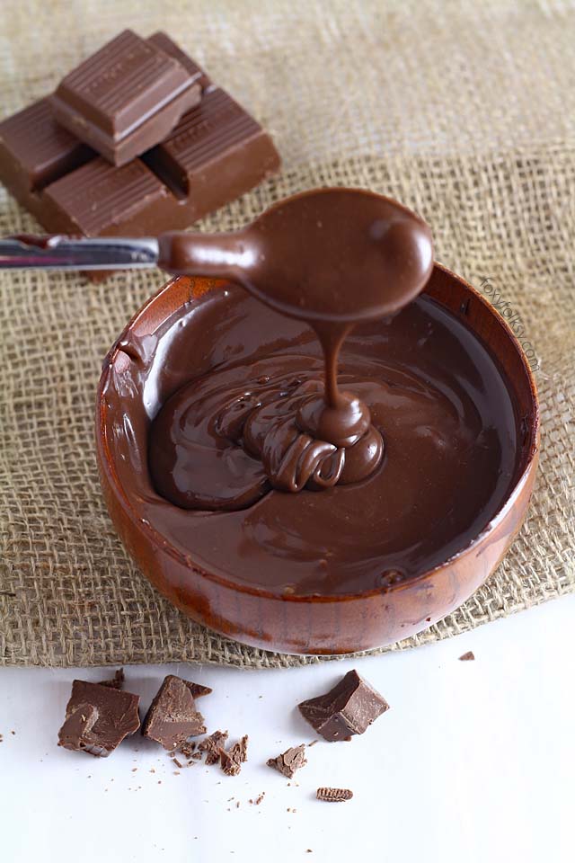 Learn how easy it is to make chocolate ganache to use as glaze, icing, sauce, or filling! | www.foxyfolksy.com