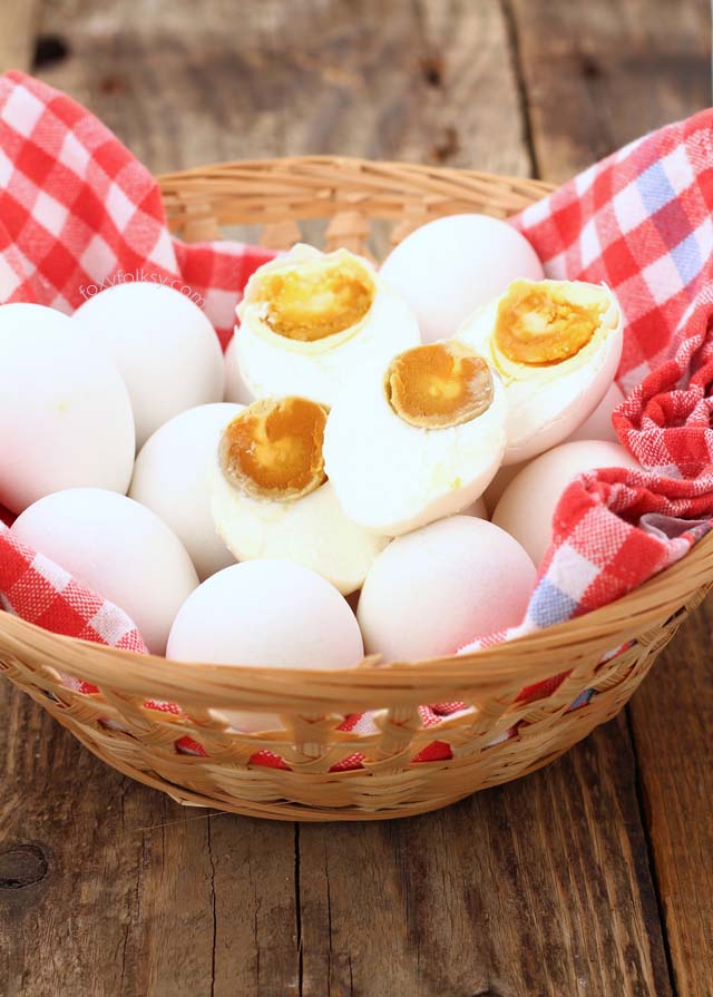 Learn how to make salted eggs, using only brine solution. Salted egg is a popular delicacy both in the Philippines and China that is widely used for various dishes. | www.foxyfolksy.com