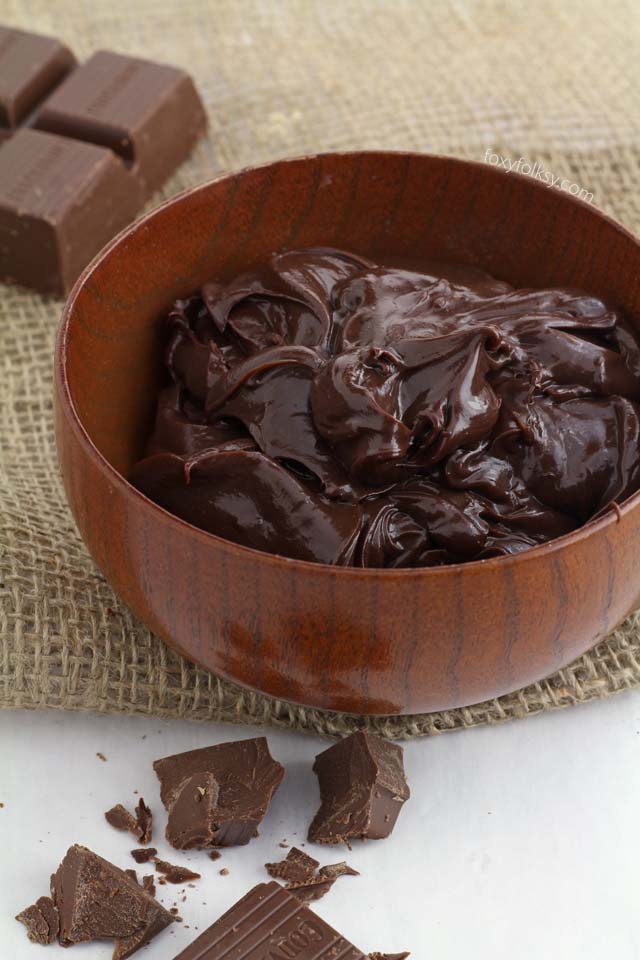 Learn how easy it is to make chocolate ganache to use as glaze, icing, sauce, or filling! | www.foxyfolksy.com