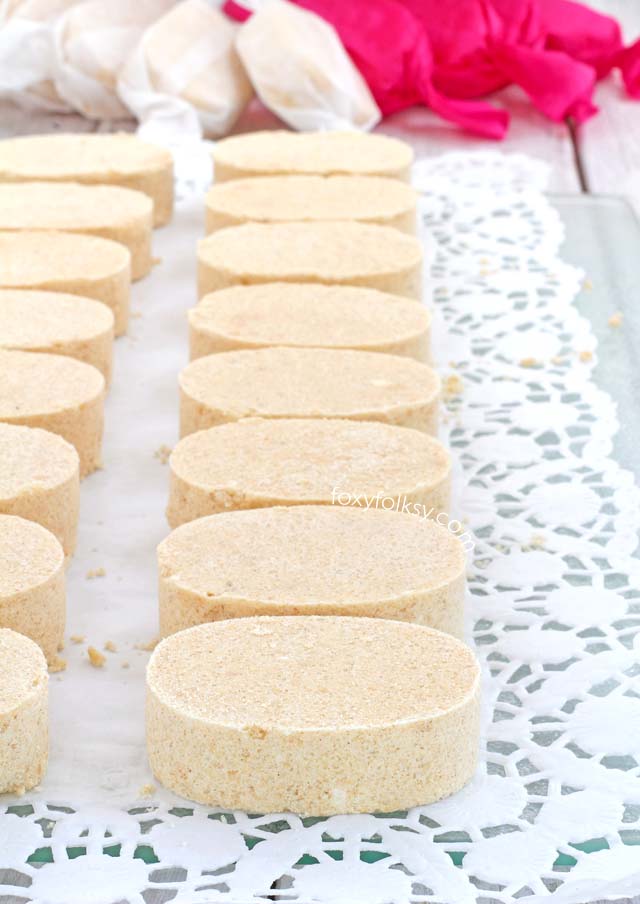 Polvoron is a Filipino shortbread-like cookie/ candy made of roasted flour, powdered skim milk, sugar and butter and this has added cashew in it to make it extra special. It is so easy to make and a real treat. |www.foxyfolksy.com