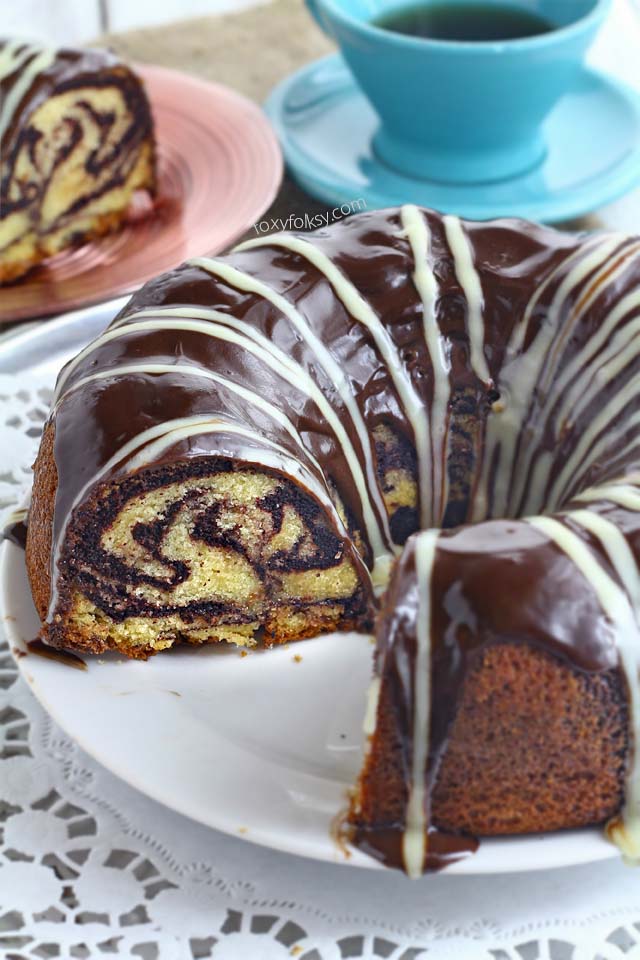 Get this simple and easy recipe for a soft, spongy yet moist Marble cake. | www.foxyfolksy.com