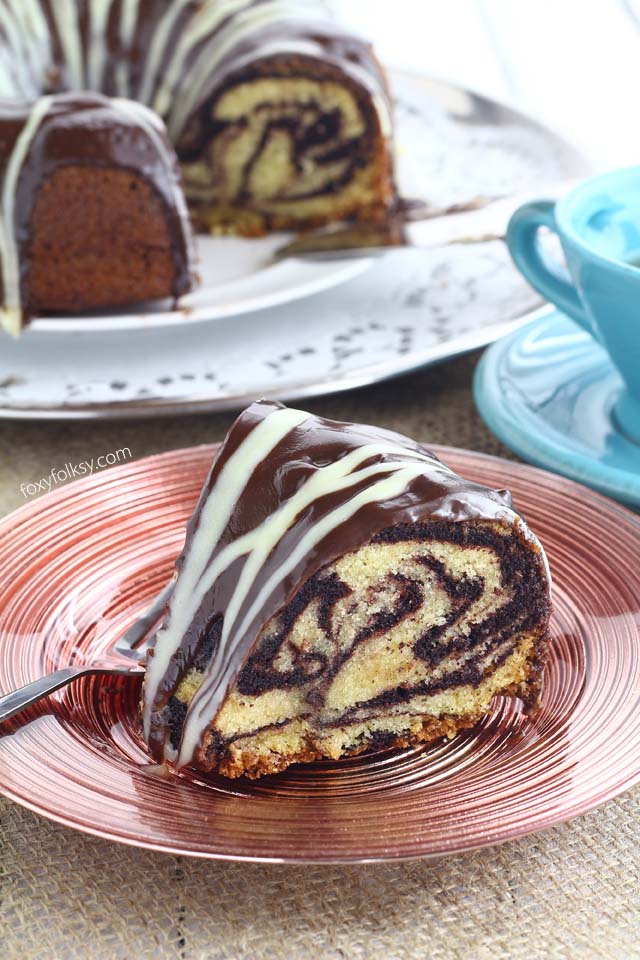 Get this simple and easy recipe for a soft, spongy yet moist Marble cake. | www.foxyfolksy.com
