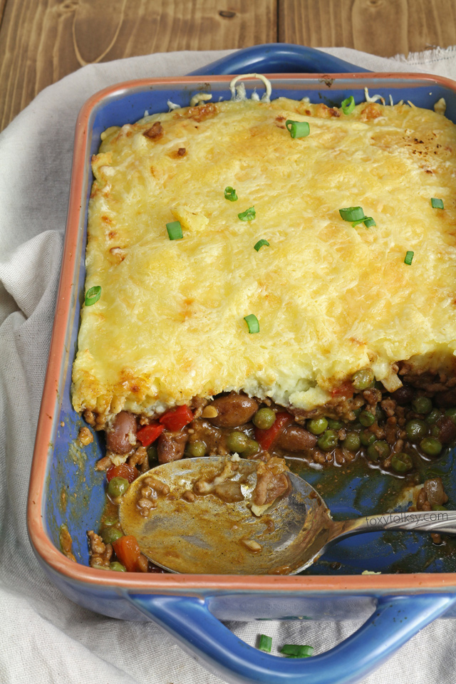 Try this easy chili Shepherd's Pie recipe. A favorite complete all-in-one meal that is done in a jiffy! | www.foxyfolksy.com