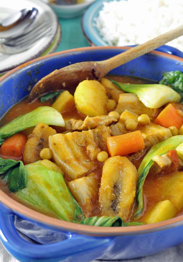 Try this Filipino Pork Pochero recipe using pork belly. A tomato-based stew that has ripe plantain bananas that set it apart from any other! | www.foxyfolksy.com