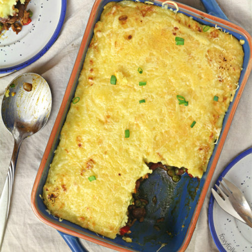 Try this easy chili Shepherd's Pie recipe. A favorite complete all-in-one meal that is done in a jiffy! | www.foxyfolksy.com