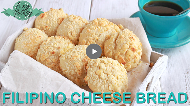 Filipino Cheese Bread is popular breakfast or afternoon snack. It is sweet and milky unlike other cheese bread there is! | www.foxyfolksy.com