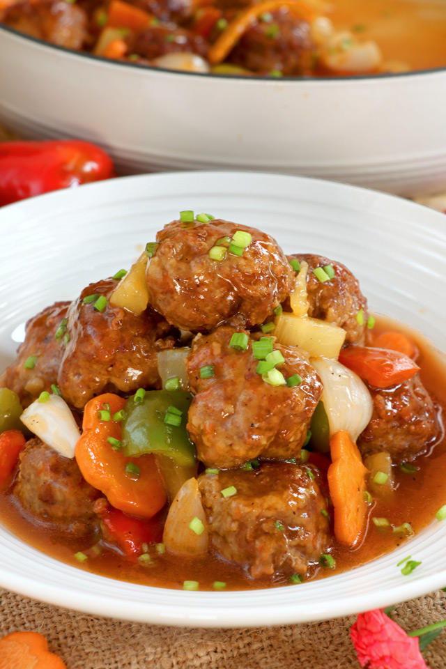 Fried meatballs simmered in sweet and sour sauce