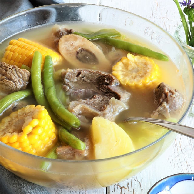 Nilagang Baka is a Filipino beef soup cooked until the meat is really tender and with vegetables like potatoes, beans and cabbage that makes this simple soup healthy and flavorful. | www.foxyfolksy.com