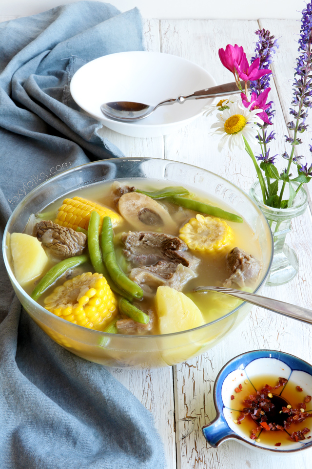 Nilagang Baka is a Filipino beef soup cooked until the meat is really tender and with vegetables like potatoes, beans and cabbage that makes this simple soup healthy and flavorful. | www.foxyfolksy.com