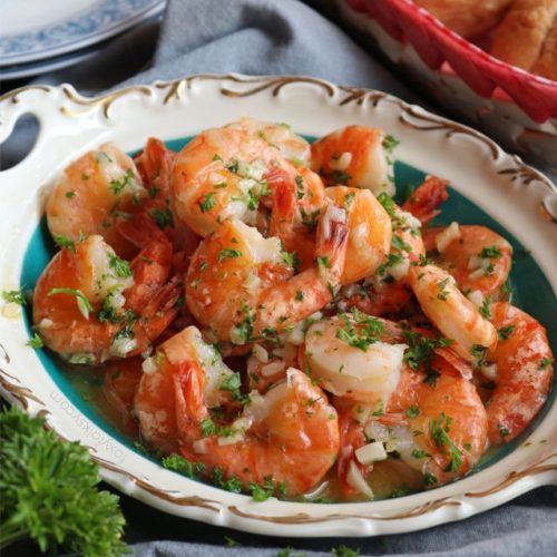 Get this easy, delicious Garlic Butter Shrimp Recipe . It has a secret ingredient that makes the shrimps sweeter and tastier. | www.foxyfolksy.com