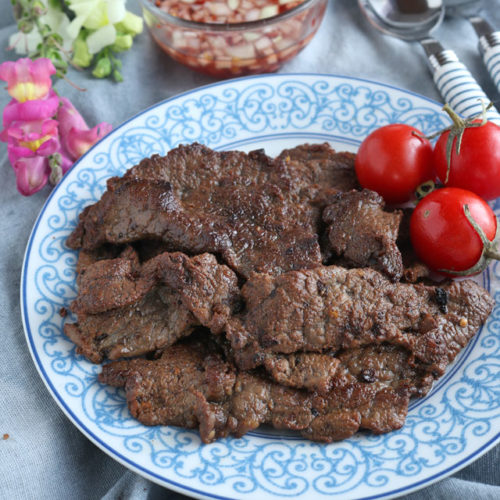 Beef tapa is a type of cured meat of thin slices of tender beef. A popular breakfast that is usually served with a sunny-side up egg and fried rice. | www.foxyfolksy.com