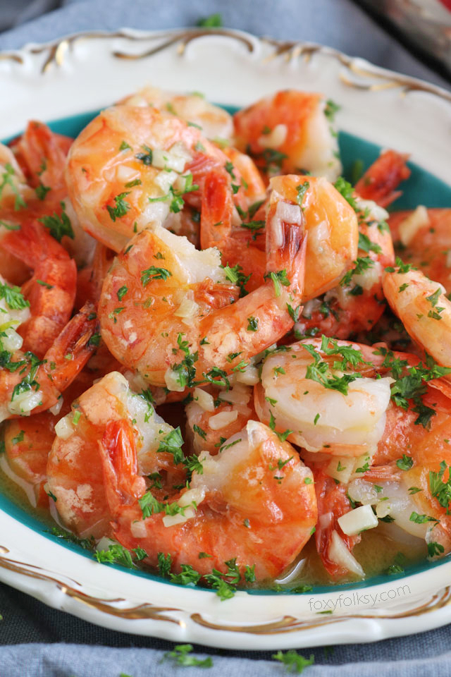 Get this easy, delicious Garlic Butter Shrimp Recipe . It has a secret ingredient that makes the shrimps sweeter and tastier. | www.foxyfolksy.com