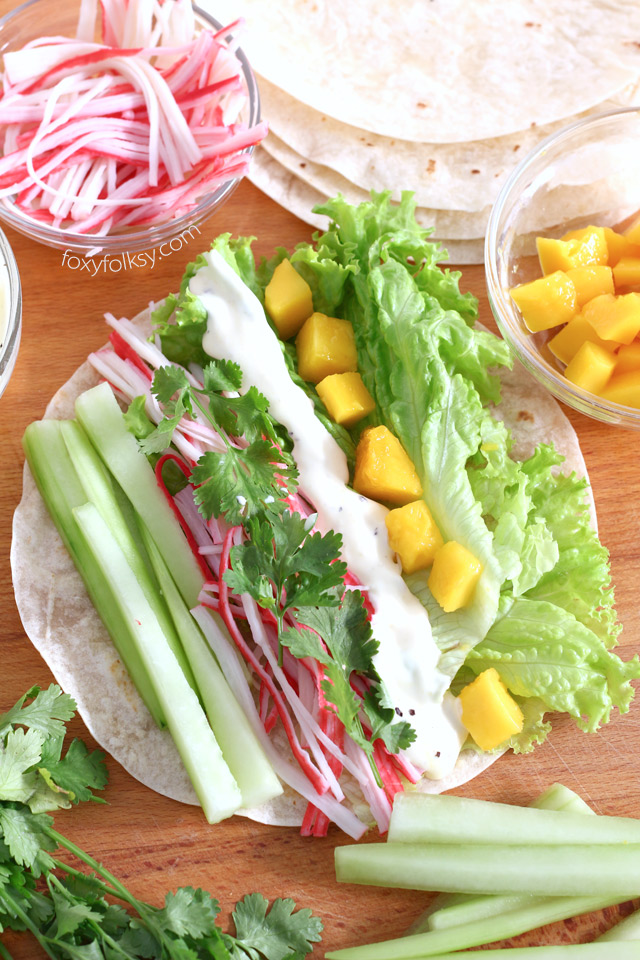 Try this very light and refreshing California Roll wrap with surimi and ripe mango and other healthy greens | www.foxyfolksy.com
