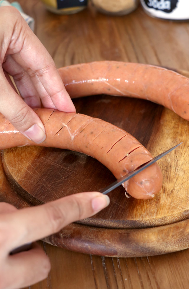 cutting sausages