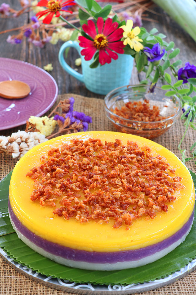 Filipino Sticky Rice Cake with 3 layers, white, violet and yellow.