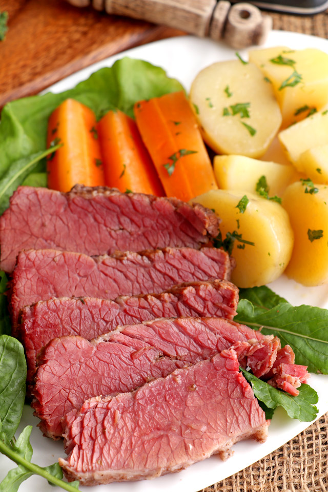 Homemade Corned Beef served with potatoes and carrots