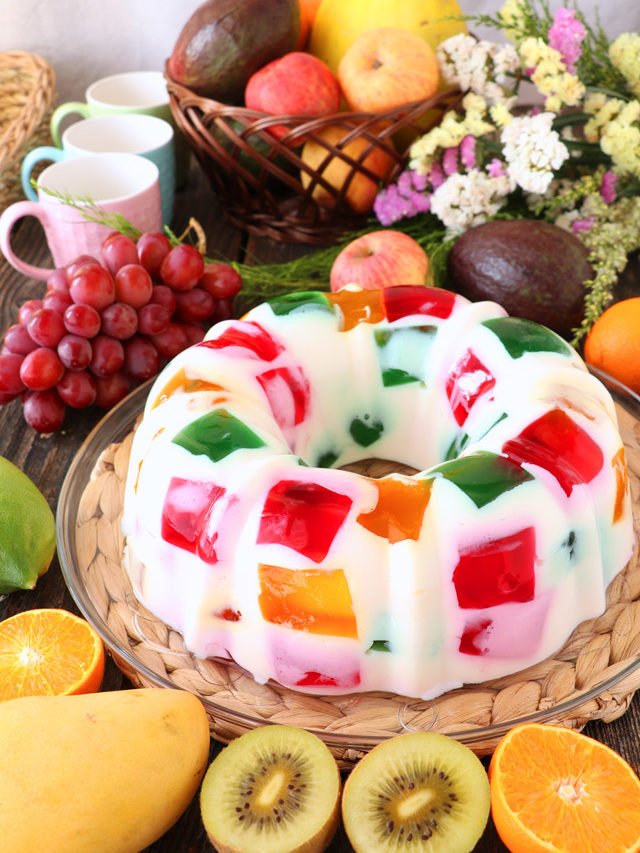 Cathedral Window Dessert with fruits in the background.