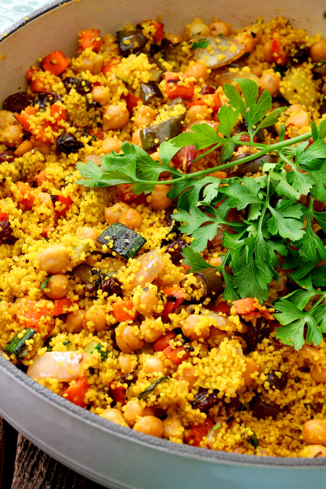 Couscous salad flavored with turmeric and other spices with roasted vegetabes.