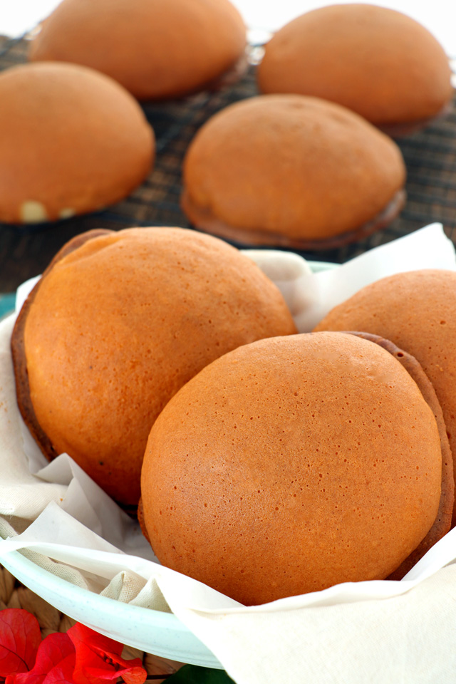 Freshly baked Kopi Roti or coffee buns on a basket