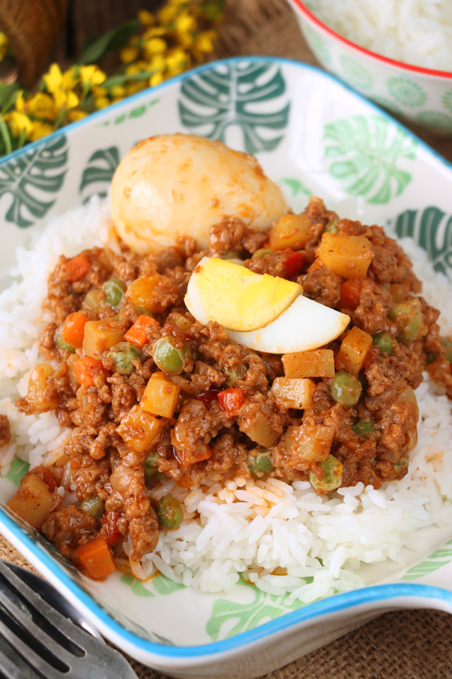 Pork Giniling recipe with egg served with rice.