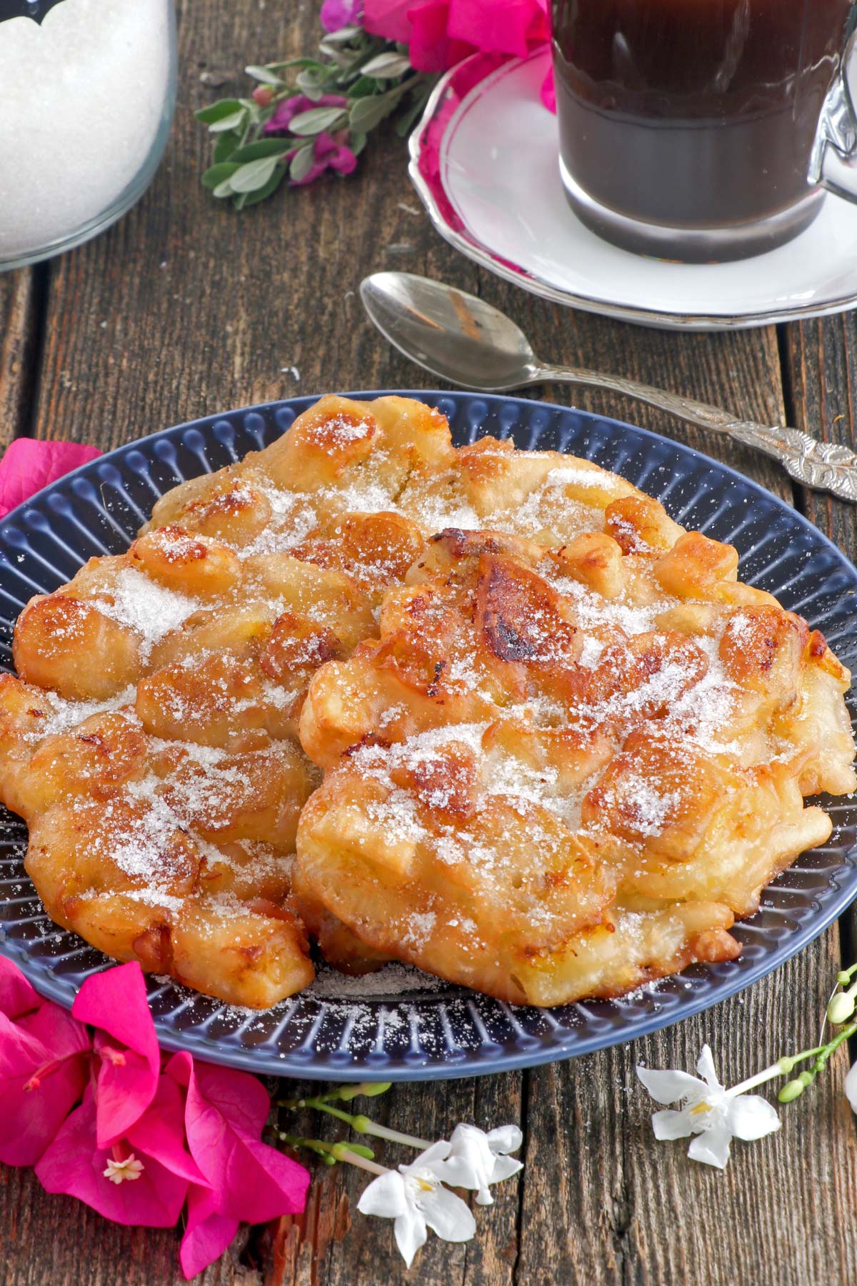 Filipino banana fritters, maruya, on a plate.