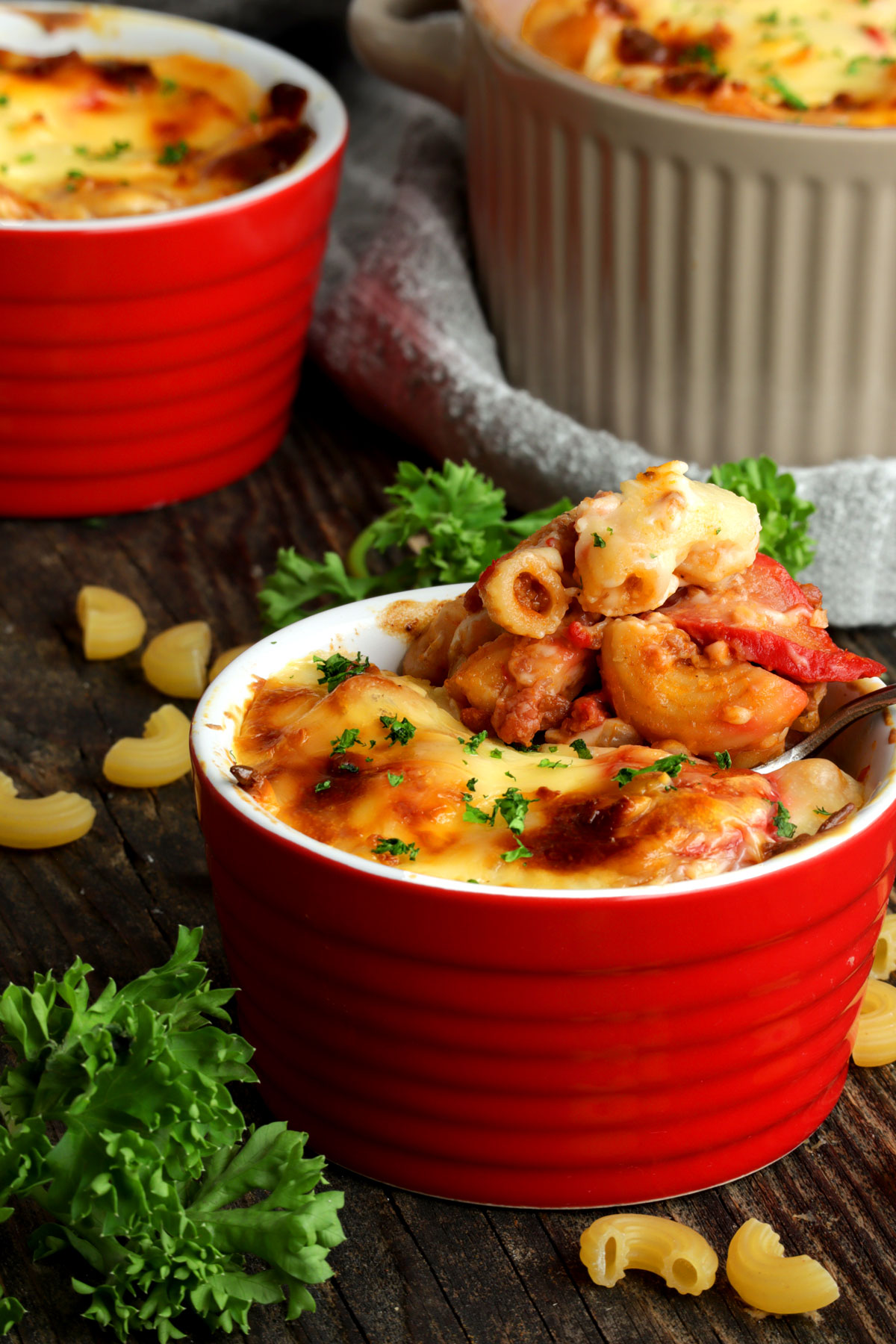 Baked Macaroni in individual small baking dishes.