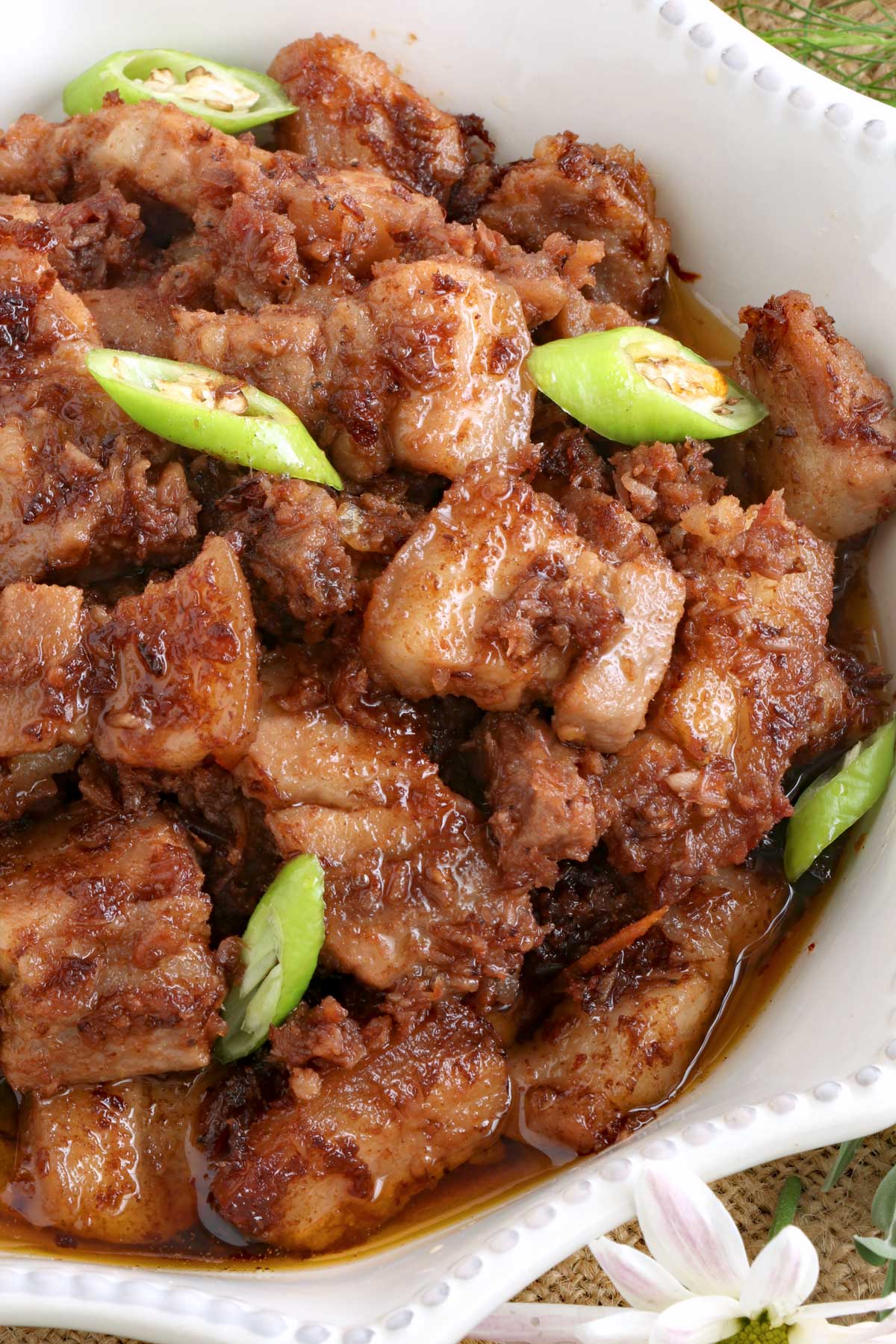 Pork Binagoongan is a Filipino pork dish cooked with shrimp paste.