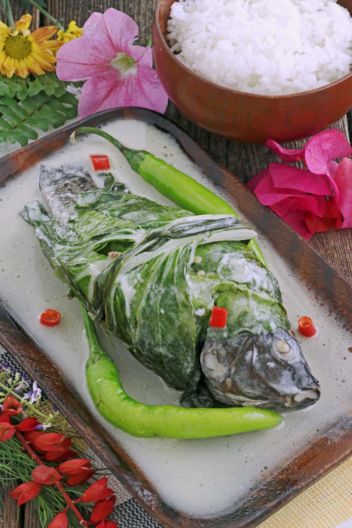 Stuffed Tilapia wraped in bok choy then cooked in coconut milk.