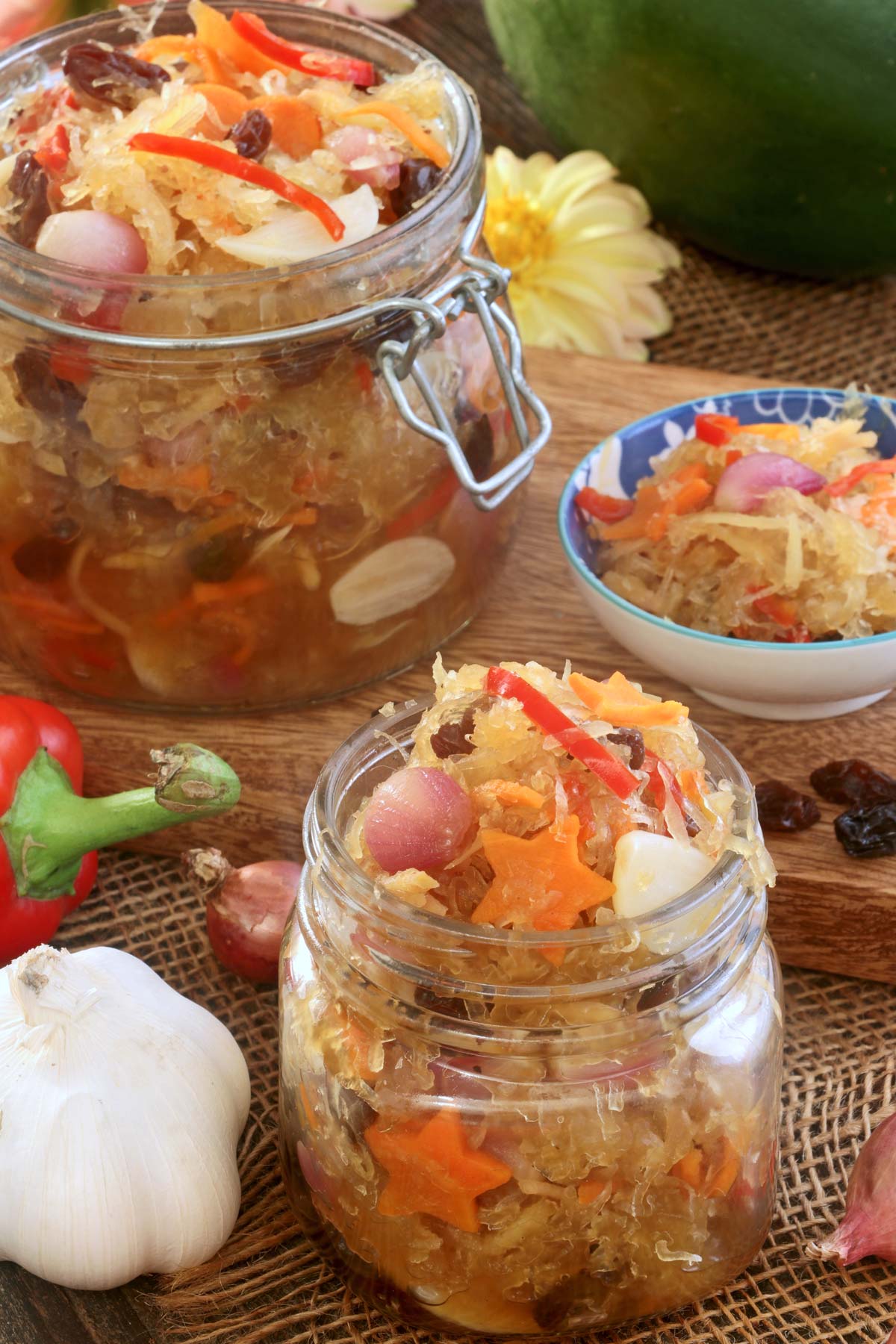 Atchara- Pickled green papaya in jars.