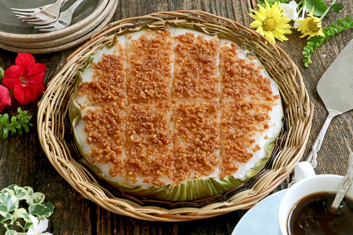 A Filipino steamed sticky rice delicacy with coconut curds. 