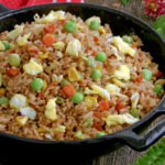 Chaofan or Chinese Fried Rice with vegetables and egg.