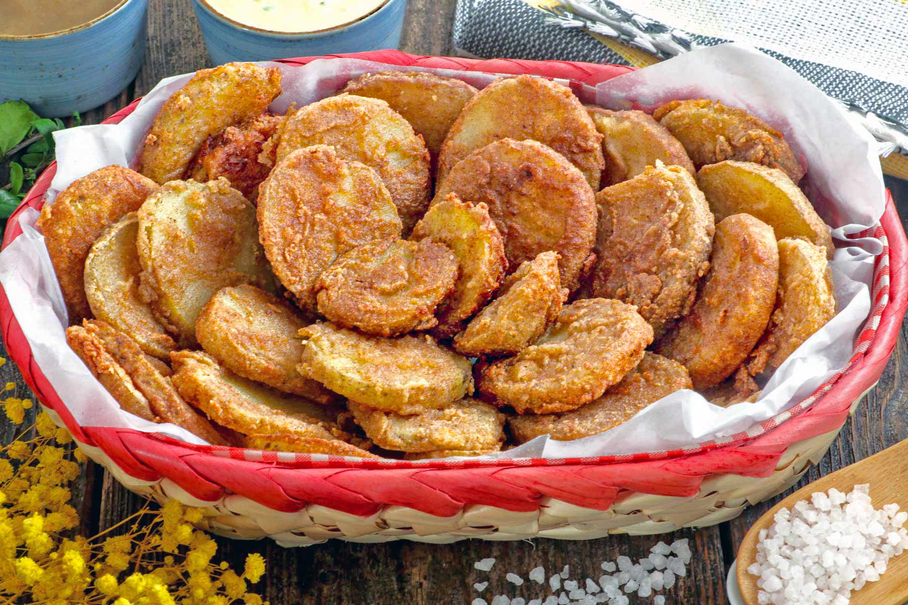 Crispy fried breaded potato slices.