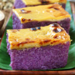 Sticky rice cake with purple yam or ube, topped with custard.