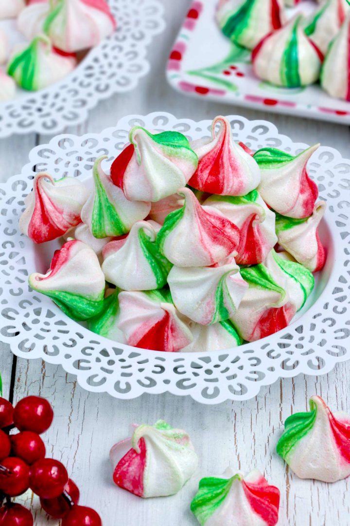 Meringue cookies in Christmas colors, red and green.
