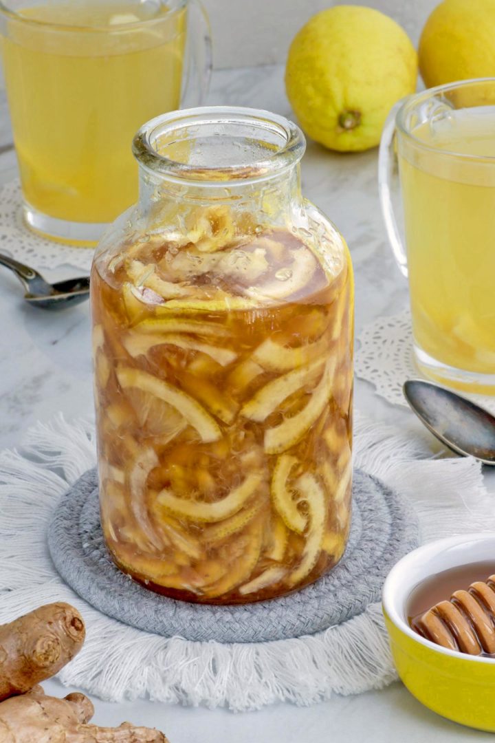 A jar of homemade honey lemon ginger tea.
