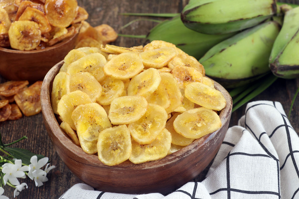 Homemade banana chips in a bowl.