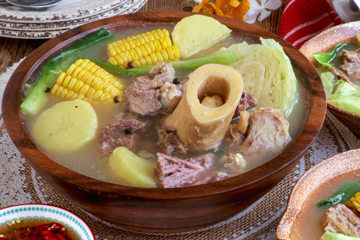 Filipino beef bulalo soup with tender meat and flavorful stock.
