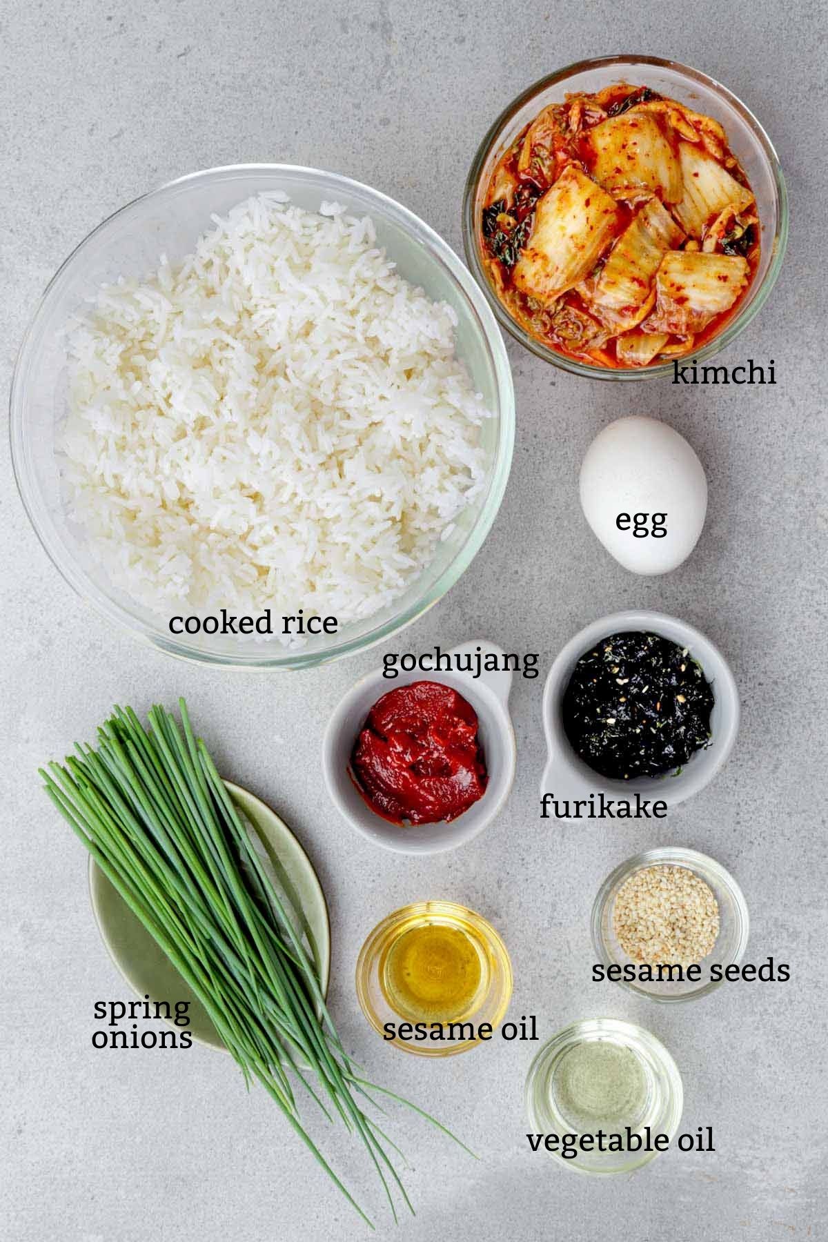 Ingredients needed to cook kimchi fried rice.