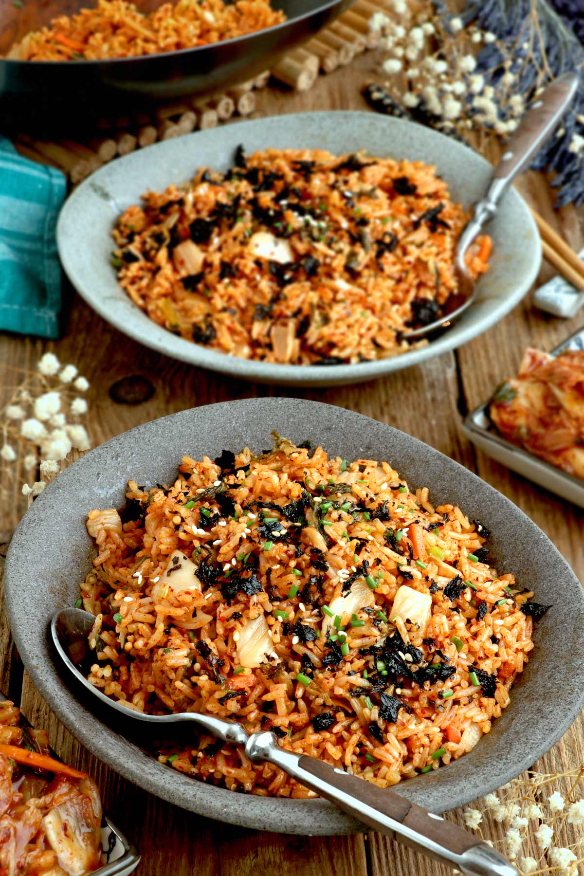 Homemade kimchi fried rice in serving plates.