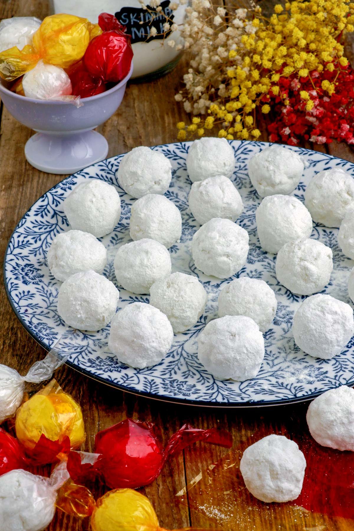Macapuno Balls coated with skimmed milk on a serving plate.