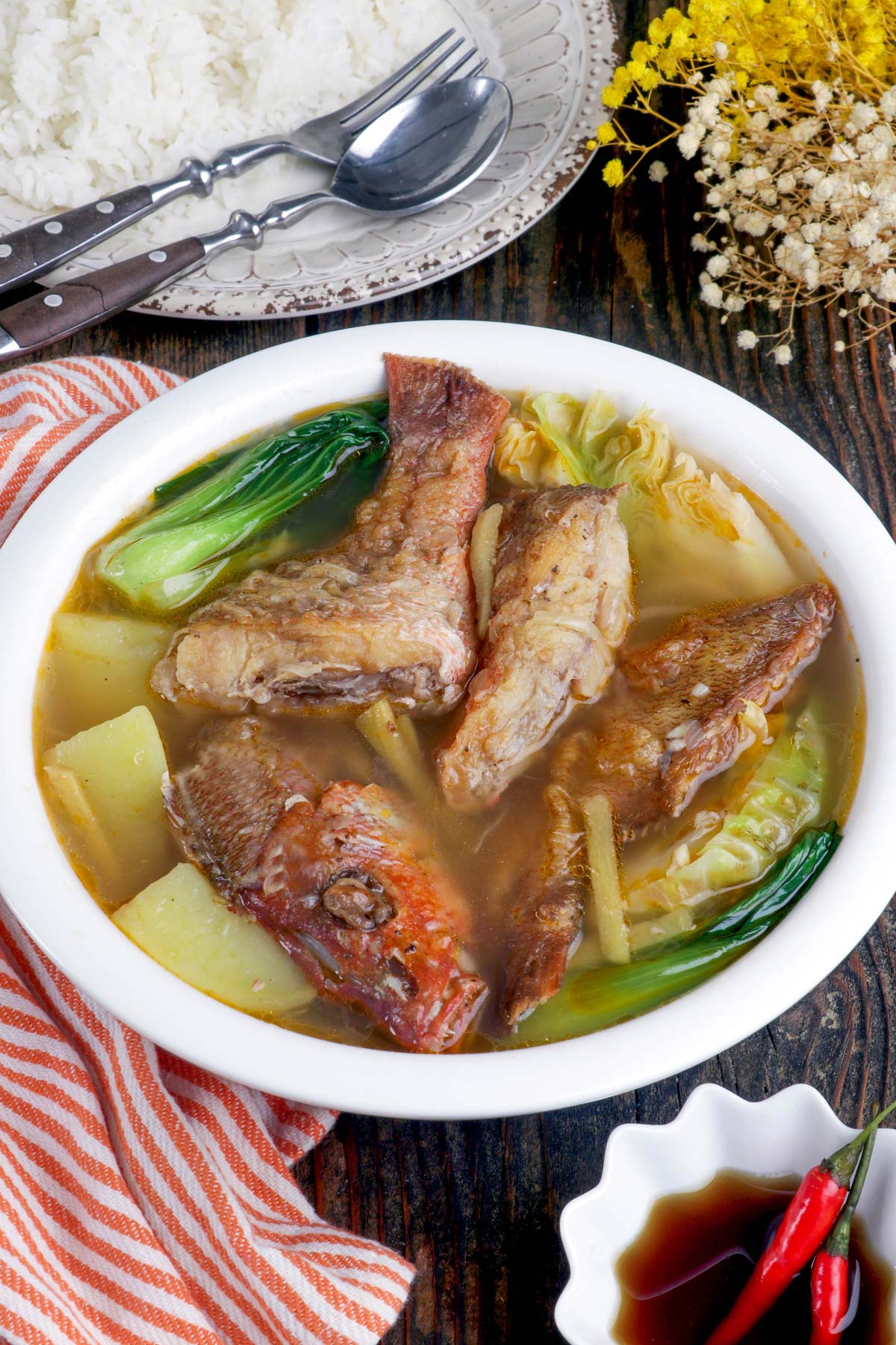 Pesang Isda in ginger flavored broth with potatoes, cabbage and bok choy.